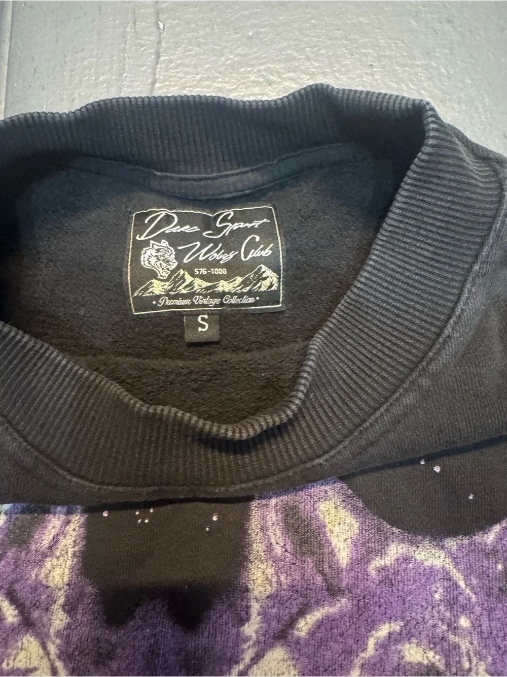 Darc Sport Black Crewneck Sweatshirt with Purple & Gold Wolves Graphic